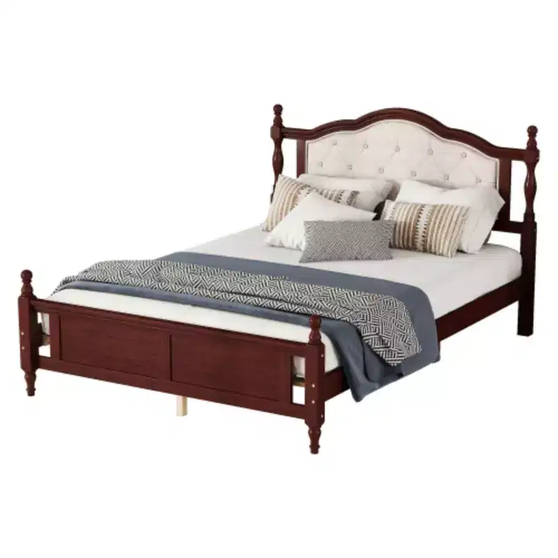 Pine Queen Bed feturing an Upholstered Headboard, Panel Footboard, and Supporting Feet
