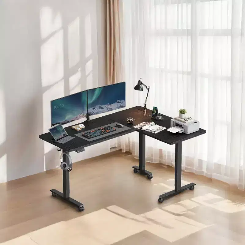 Shaped Electric Standing Desk, 63 x 47.2 inches. A height - adjustable corner desk with power outlets and 2 memory buttons.