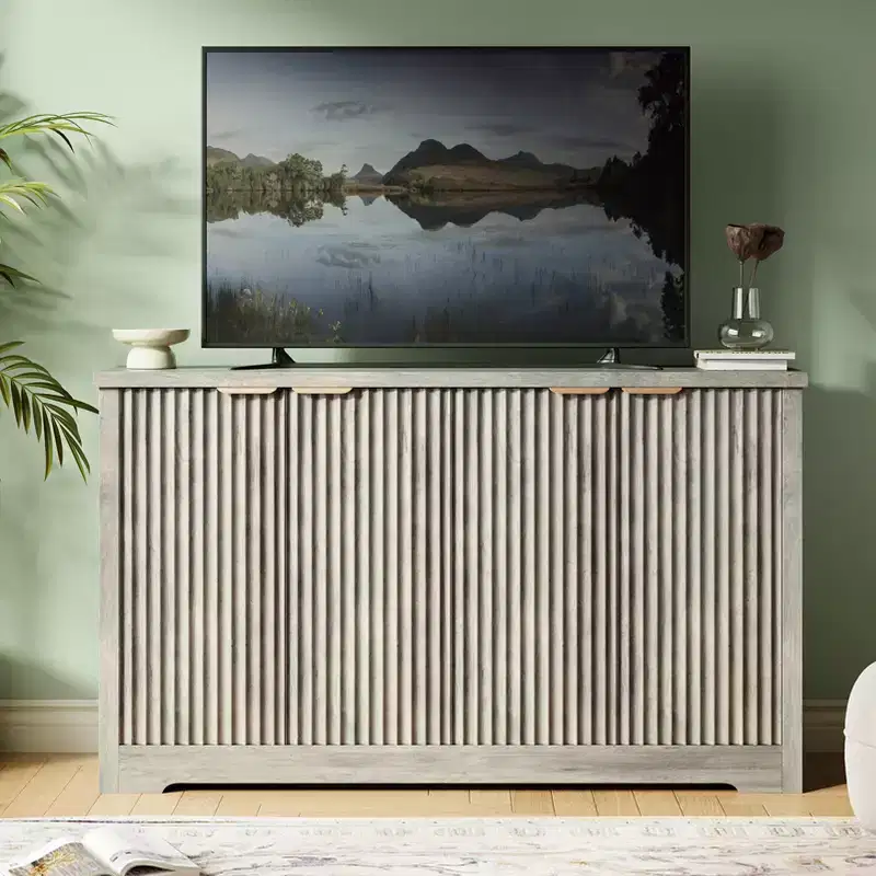 Modern decorative storage sideboard with grooved detailing, featuring doors and shelves. Crafted from wood, ideal for living rooms, entryways