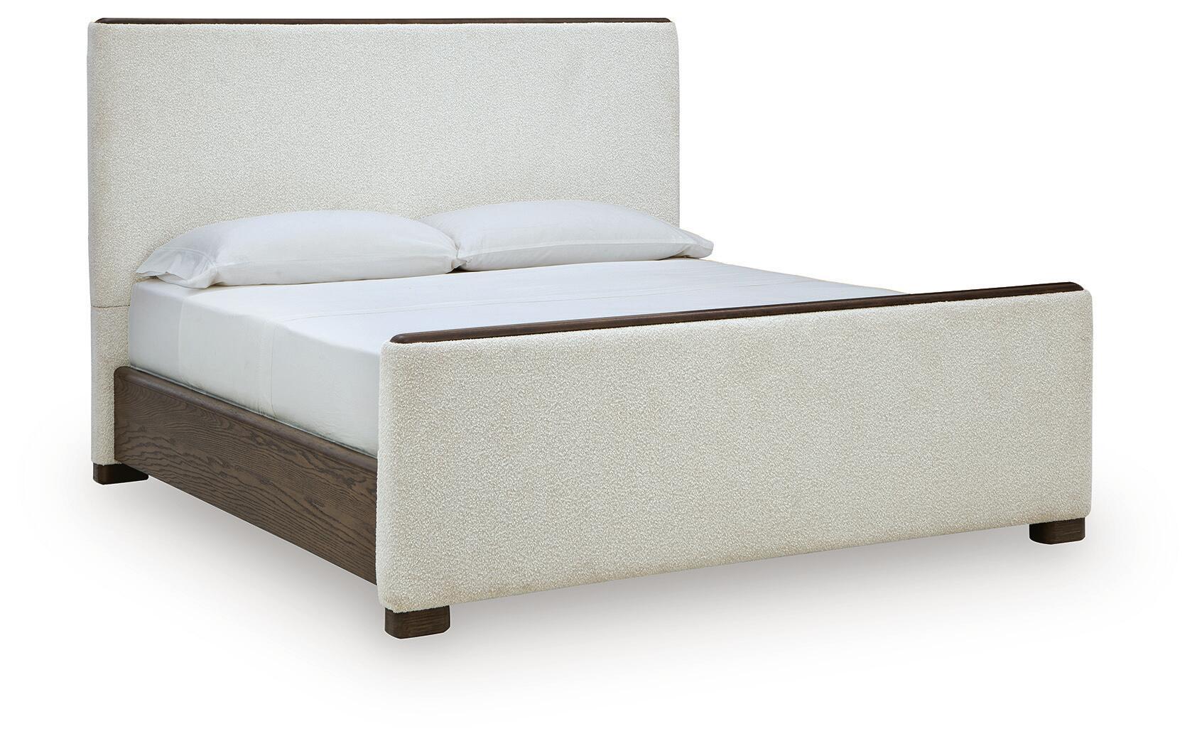 Upholstered Panel Bed — Its clean-lined silhouette is softened with a boucle-like fabric