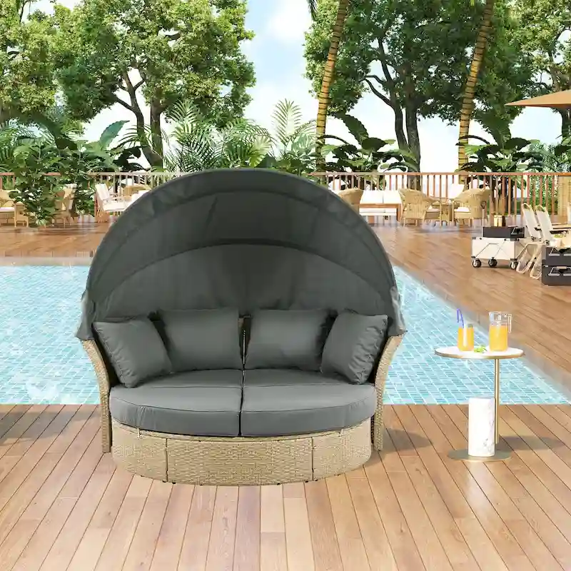 Brown Wicker Rattan Outdoor Day Bed with Gray Cushions and Gray Retractable Canopy