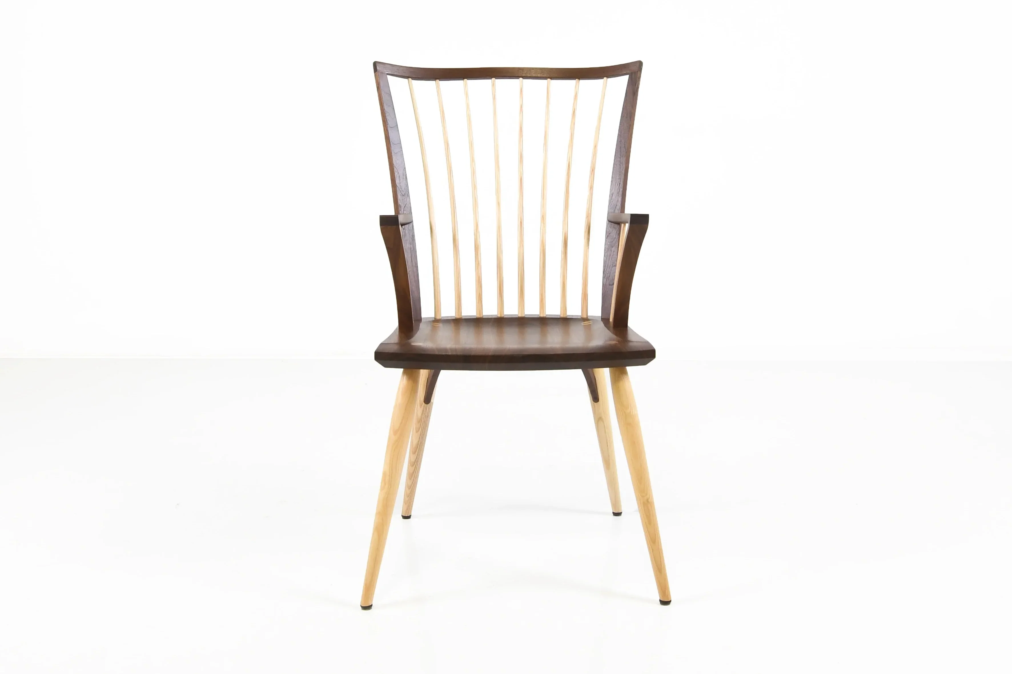 Arm Chair - A fresh derivation of the seminal our finds the perfect balance between light and substance