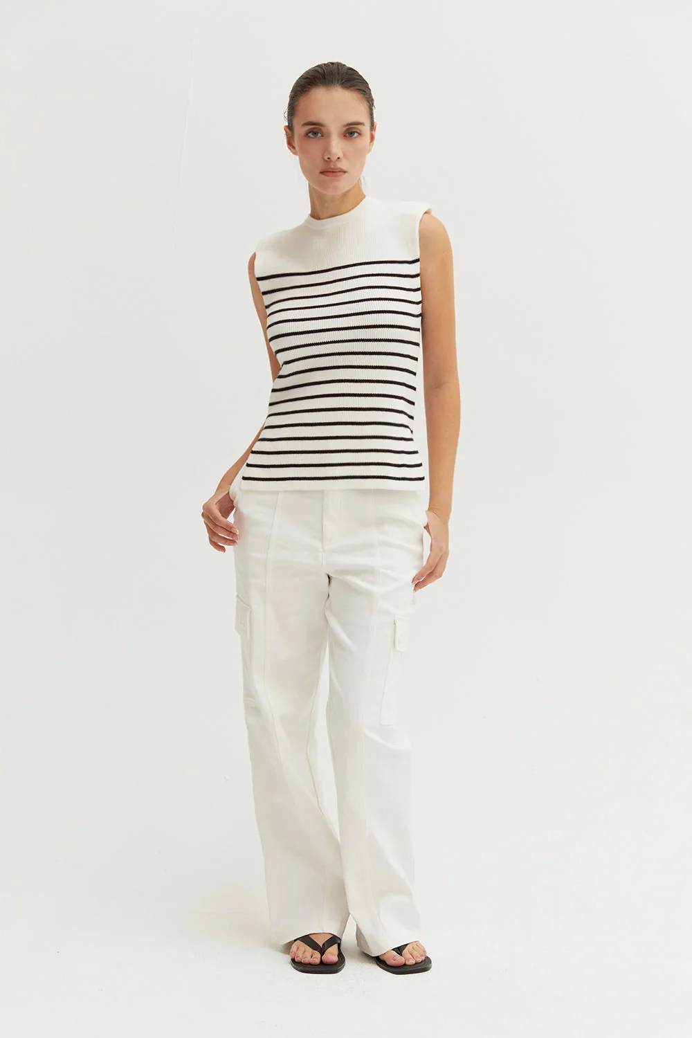 Ribbed Stripe Sleeveless Knit Top with Padded Shoulders and Side Slits