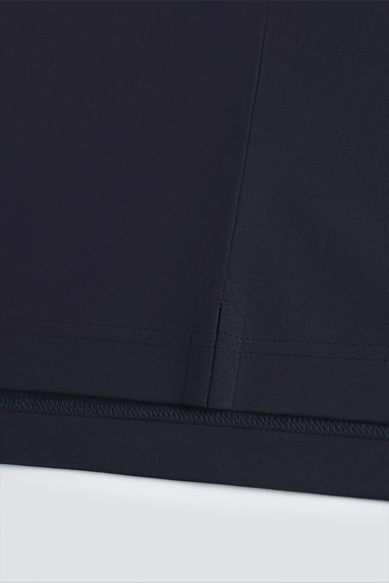 Waffle-Knit Buttonless Polo – White