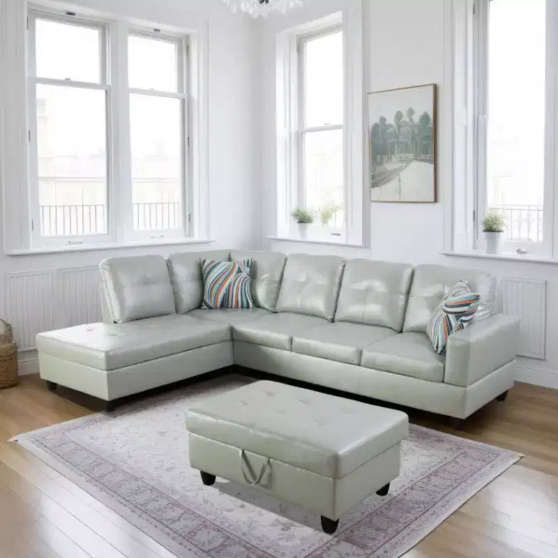 Gray PU Leather Sectional Sofa Suite L-Shaped Configuration, Tufted Upholstery, Versatile Storage Ottoman, Contemporary Living Space Solution