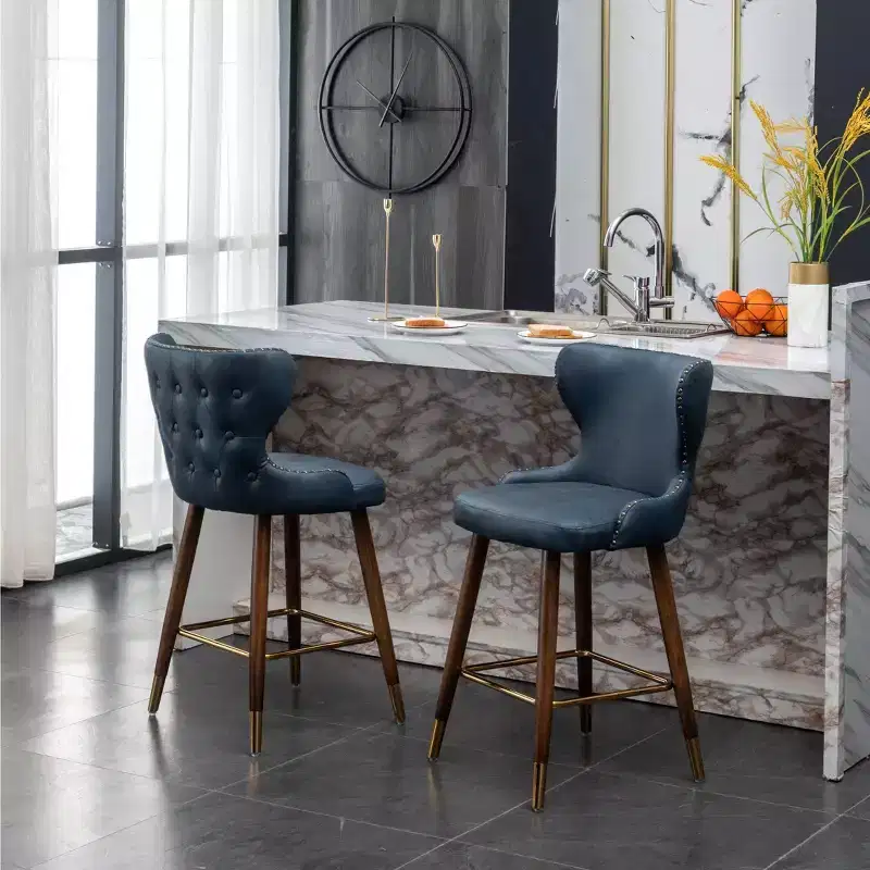 Roundhill Furniture Nevis Mid-century Modern Faux Leather Tufted Nailhead Trim Counter Stool, Blue, Set of 2