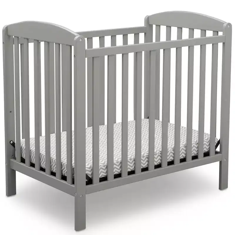 Delta Children Sprout Mini Crib With Adjustable Height and Mattress