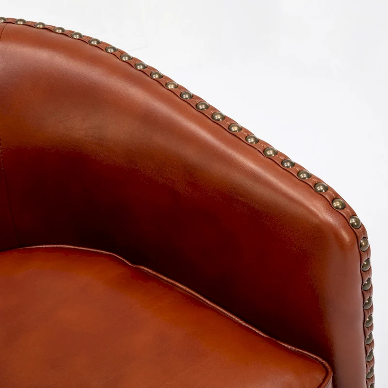 Truman Faux Leather Swivel Arm Chair with Nailhead Trim by Greyson Living