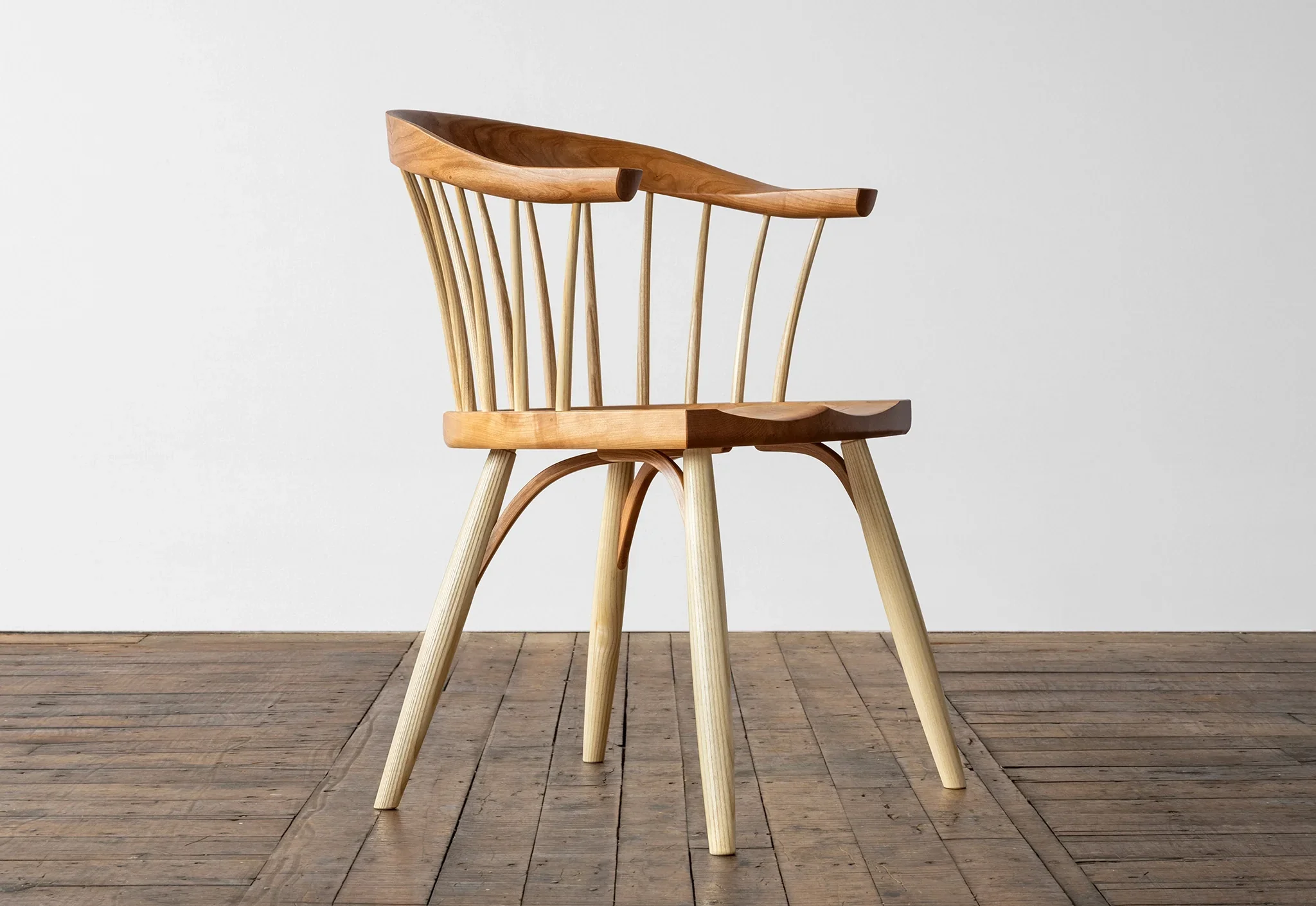 Newport Chair - The Newport Chair finds its inspiration in a dozen low-backed Windsor chairs purchased for a library in