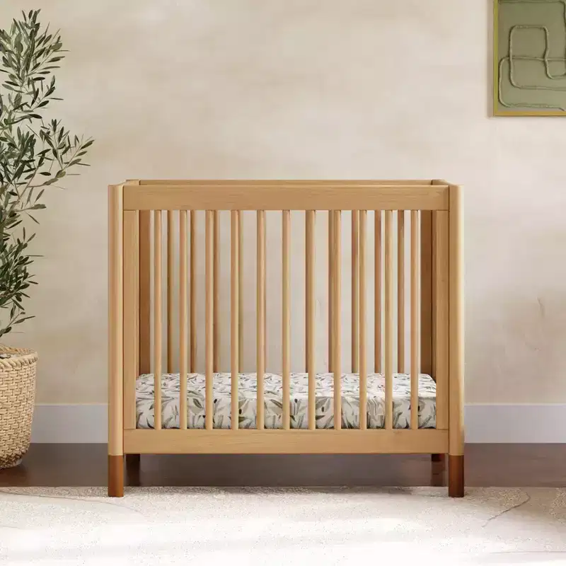 4-in-1 Convertible Mini Crib with Interchangeable Feet