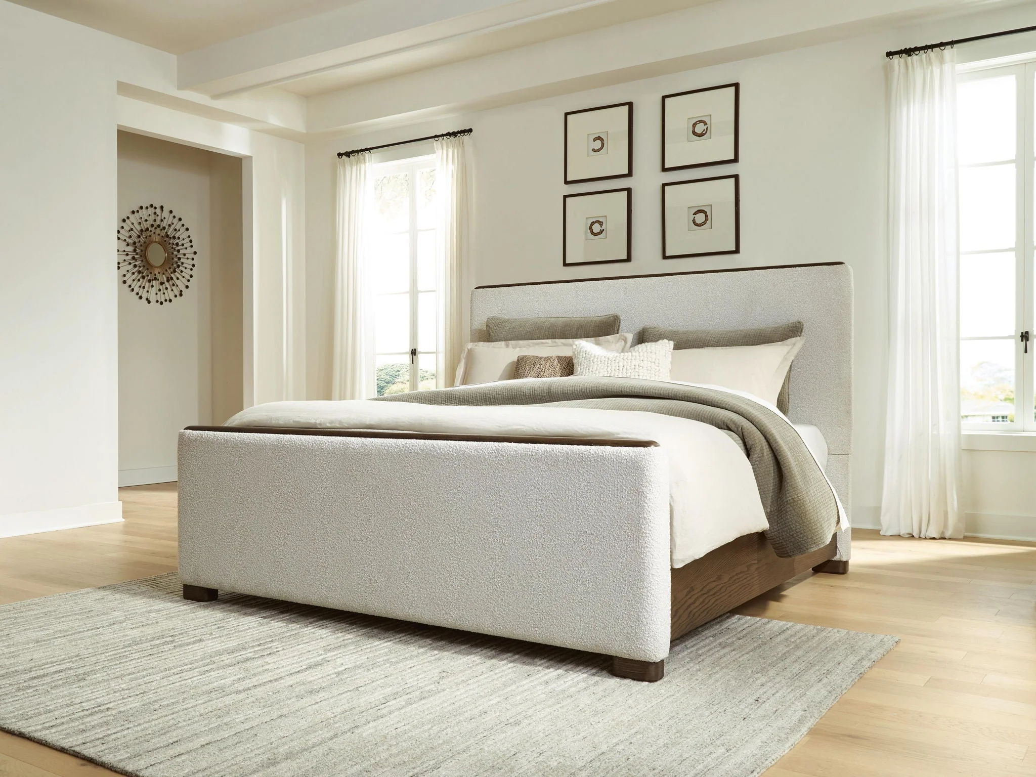 Upholstered Panel Bed — Its clean-lined silhouette is softened with a boucle-like fabric