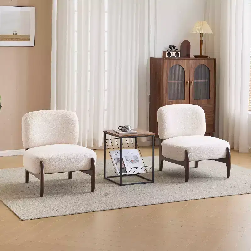 Modern-style rubberwood accent chair upholstered in boucle fabric.