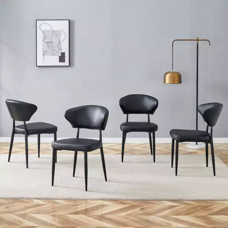 Set of 4 Black Minimalist Ergonomic Dining Chairs with Curved Backrest – PU Cushion
