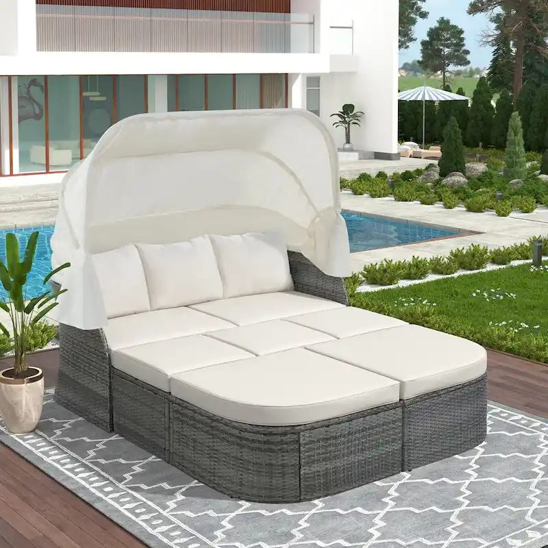 Outdoor Gray Wicker Daybed with Cushions and Retractable Canopy