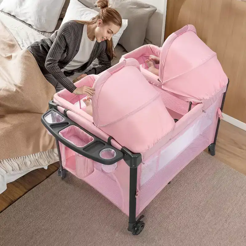Twin Bassinet for Baby, Pink Bedside Bassinet, Convertible to Bedside Sleeper and Playpen, with Wheel, Brake