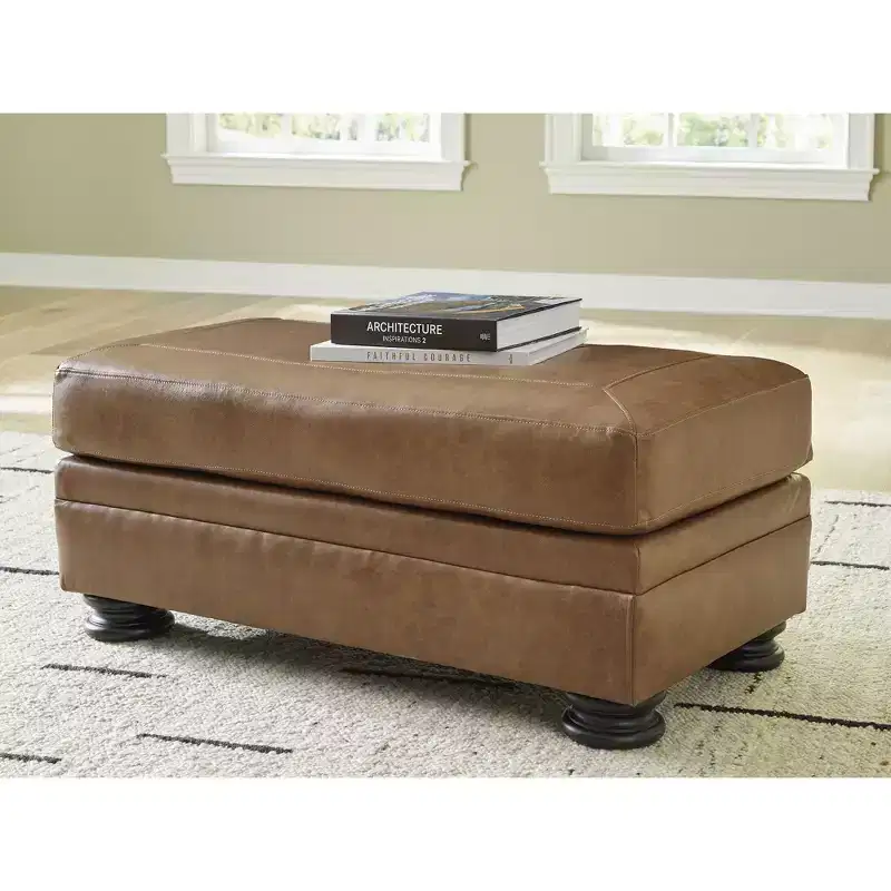 Traditional Leather Ottoman with Decorative Turn Legs – Caramel