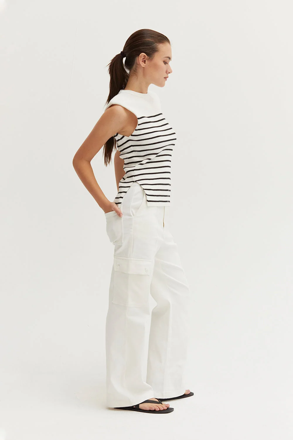Ribbed Stripe Sleeveless Knit Top with Padded Shoulders and Side Slits