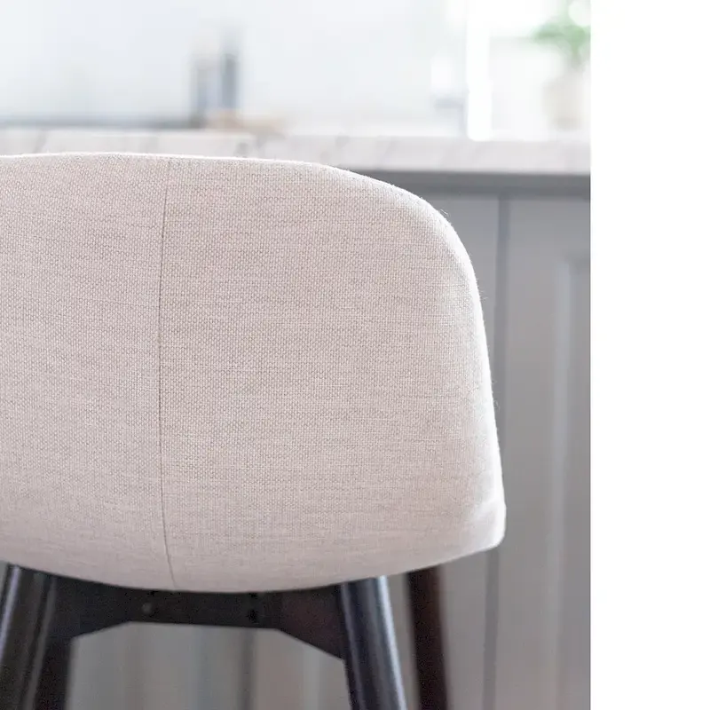 Upholstered Solid Wood Counter Stool With Footrest by East at Main
