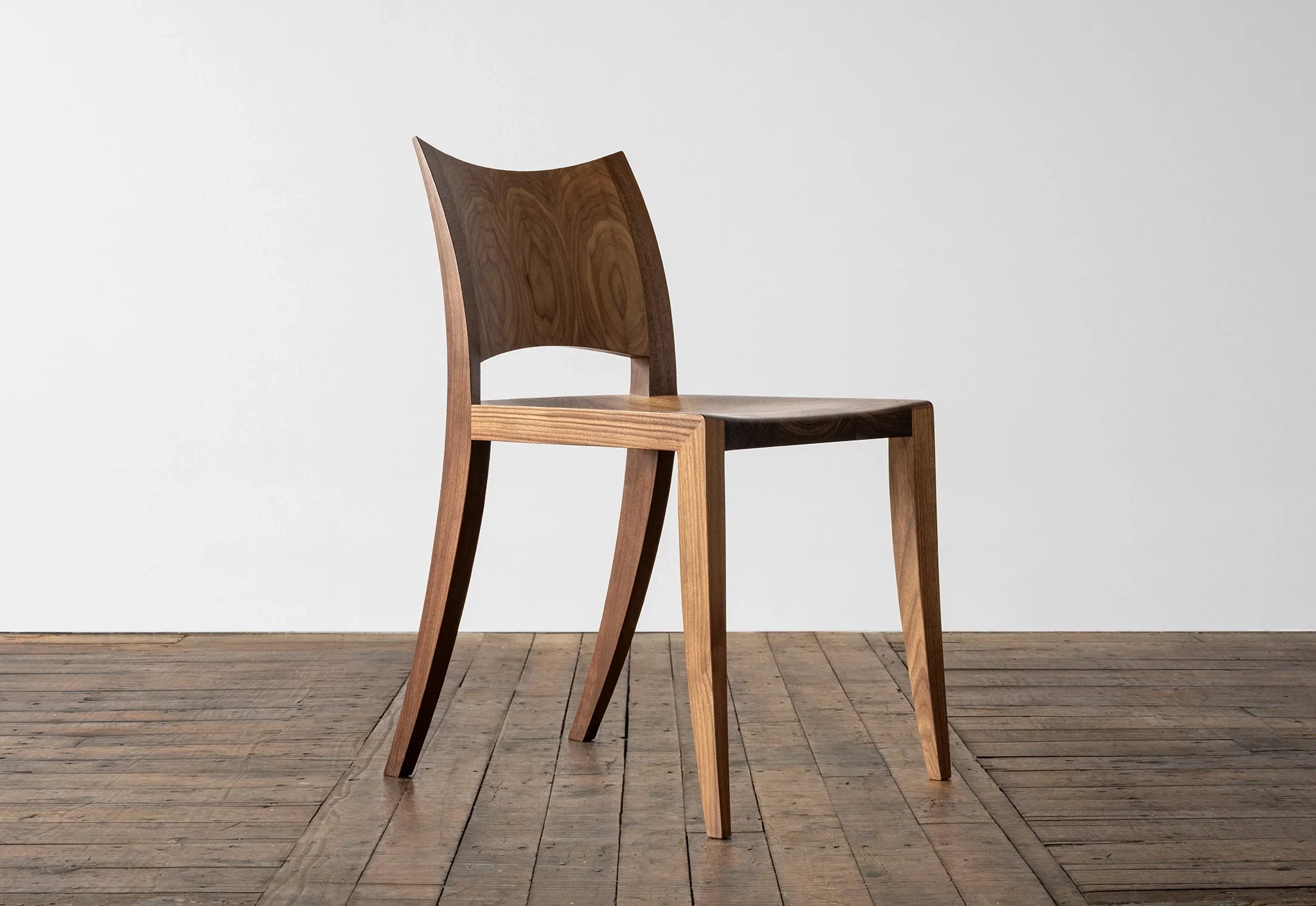 Chair - Apart from its simple, striking profile, the Chair¡¯s most prominent feature is its curved hardwood back ¨C an
