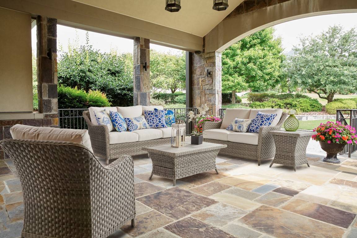 Outdoor Wicker Loveseat with Cushions in Natural Brown