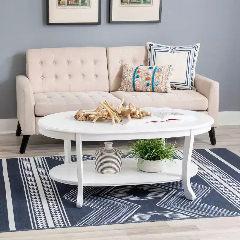 Dermott Traditional Oval Coffee Table with Bottom Shelf Rustic White - Powell