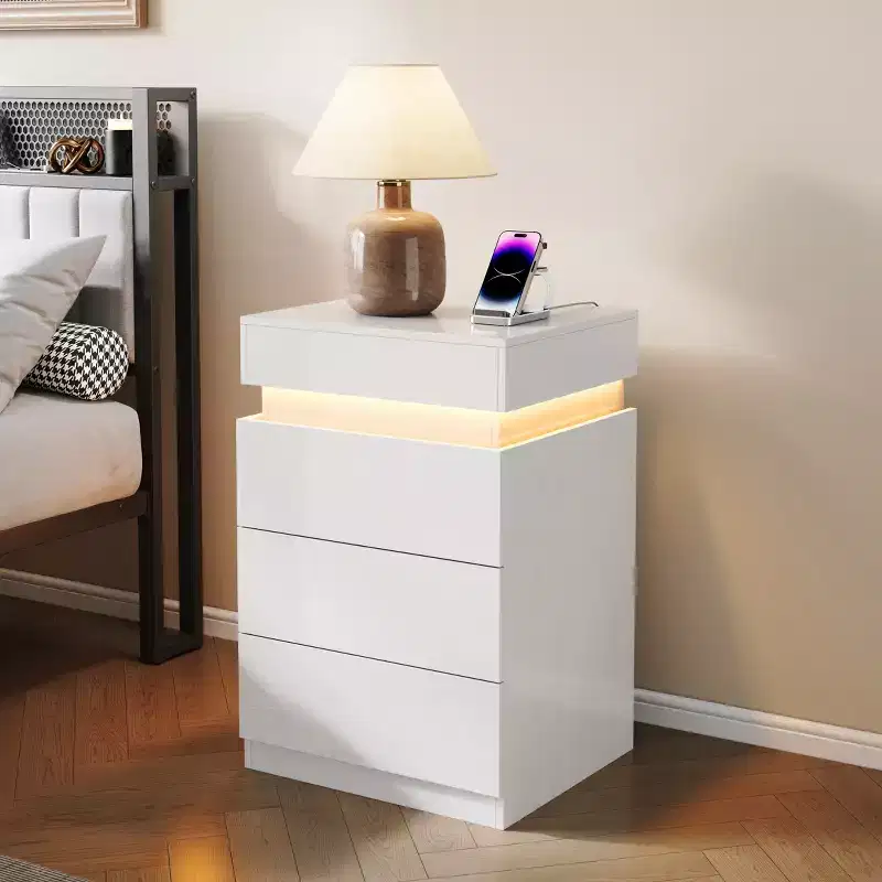 Designed for everyday convenience, this Nightstand with Built-In Charging Station and LED Lighting, 3-Drawer Sliding-Top Modern Bedside Table,.