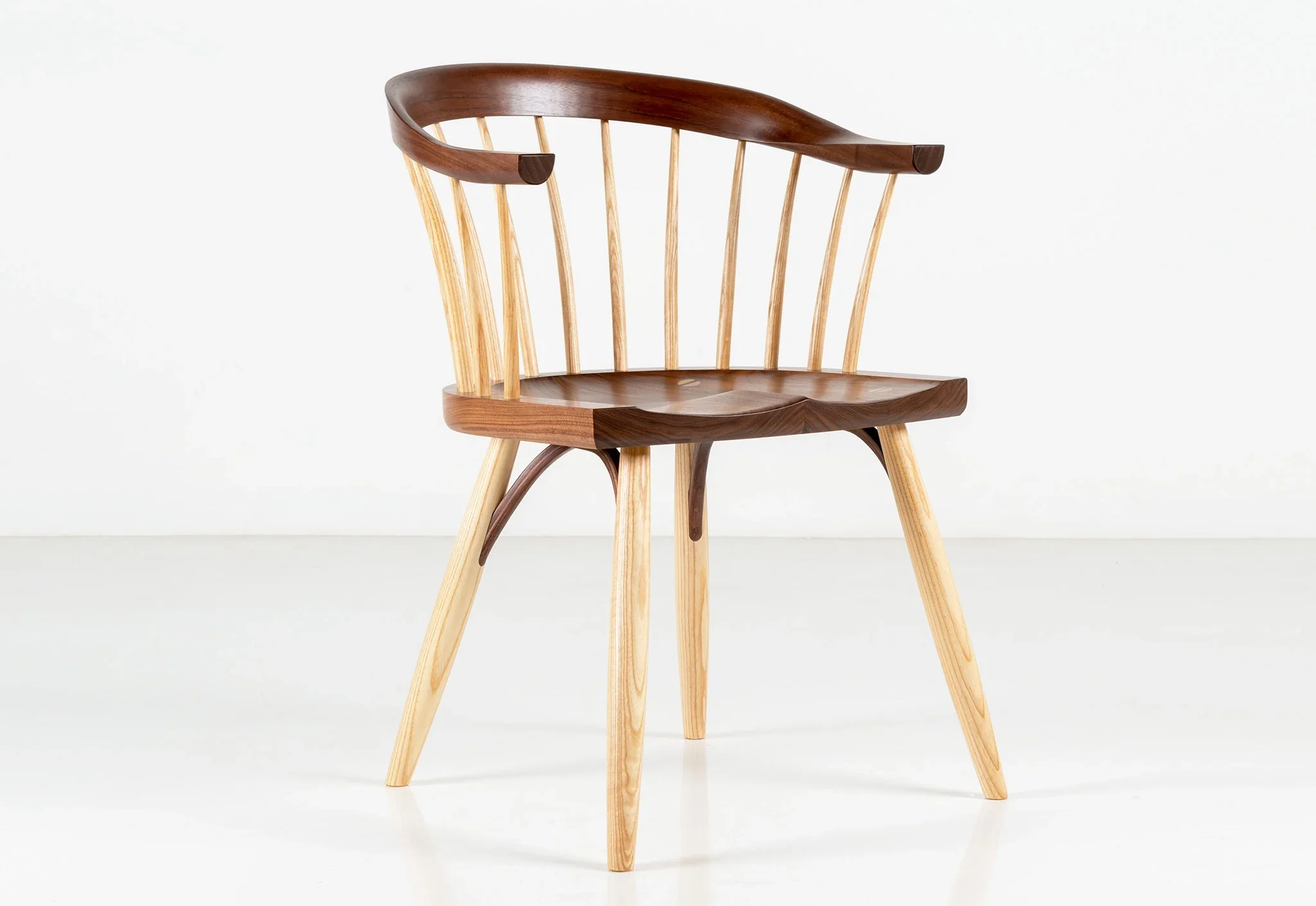 Newport Chair - The Newport Chair finds its inspiration in a dozen low-backed Windsor chairs purchased for a library in
