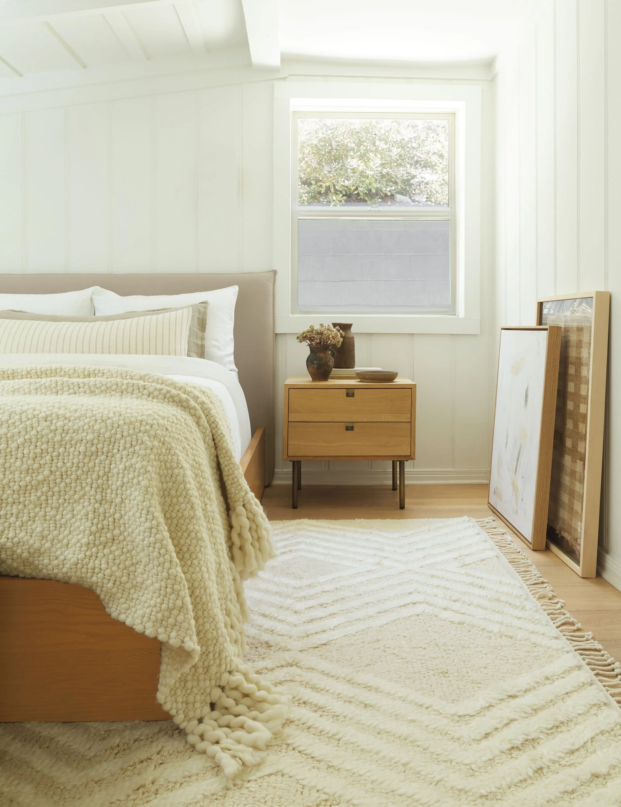 Nightstand Combining streamlined design and retro details, the collection is ideal for modern spaces. This nightstand features cutout details