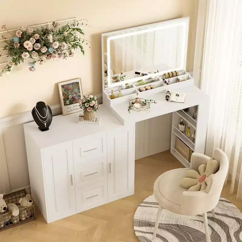 The dressing table includes a mirror with a light, 3 drawers, 2 cabinets, and storage shelves. A stool is not included White